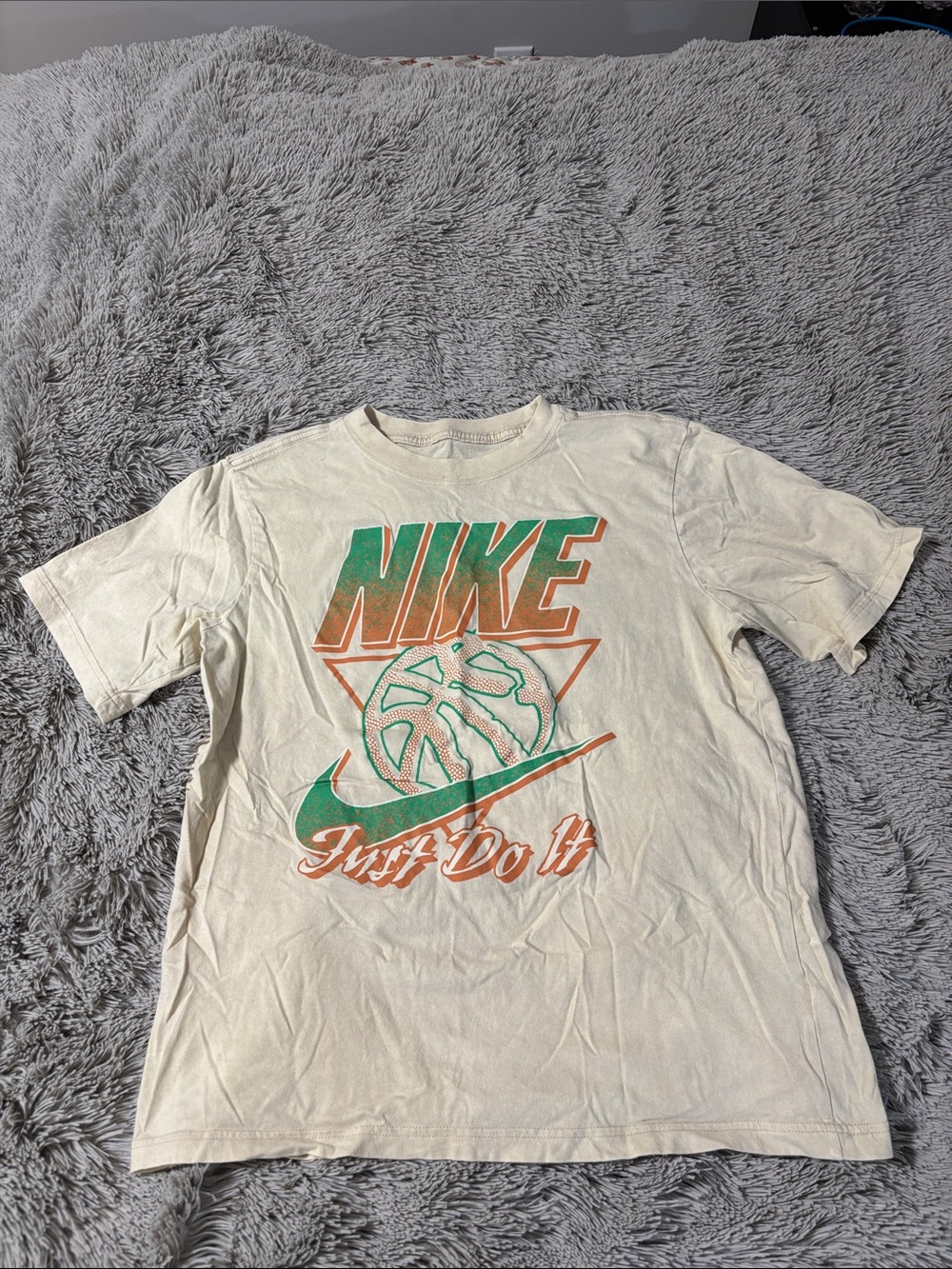 Nike Cream Tee with Green & Orange Graphic Accents
